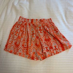 Orange pattern silk shorts